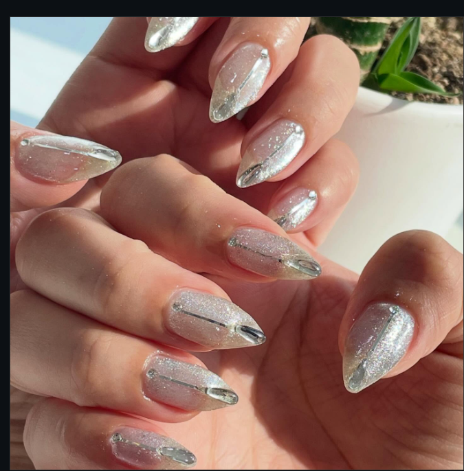 Silver chrome nails on a milky base by NAIL YEO:UN, Eastwood